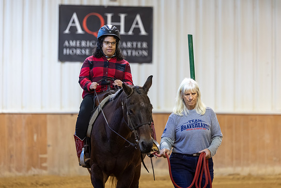 DeAnna Poe riding Amigo in Working Trails