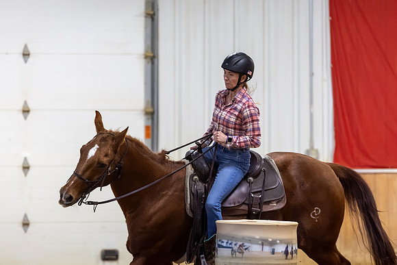 Dakota Owens riding Sly in Barrel Racing