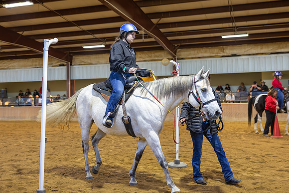 Chloe Gillum riding Tuffy in Working Trails