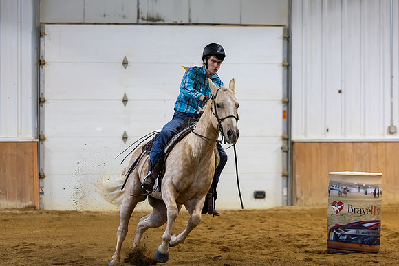 Evan McKay riding Juice in Barrel Racing