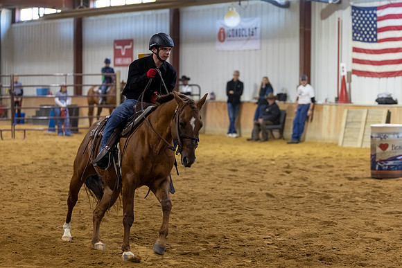 Easton Huff riding Enzo in Barrel Racing