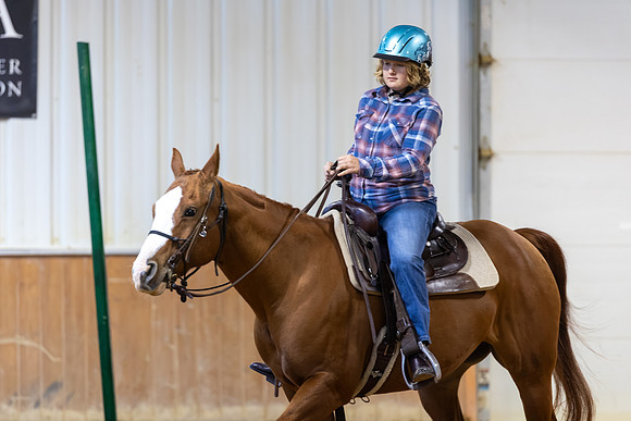 Alice Herting riding Cookie in Working Trails